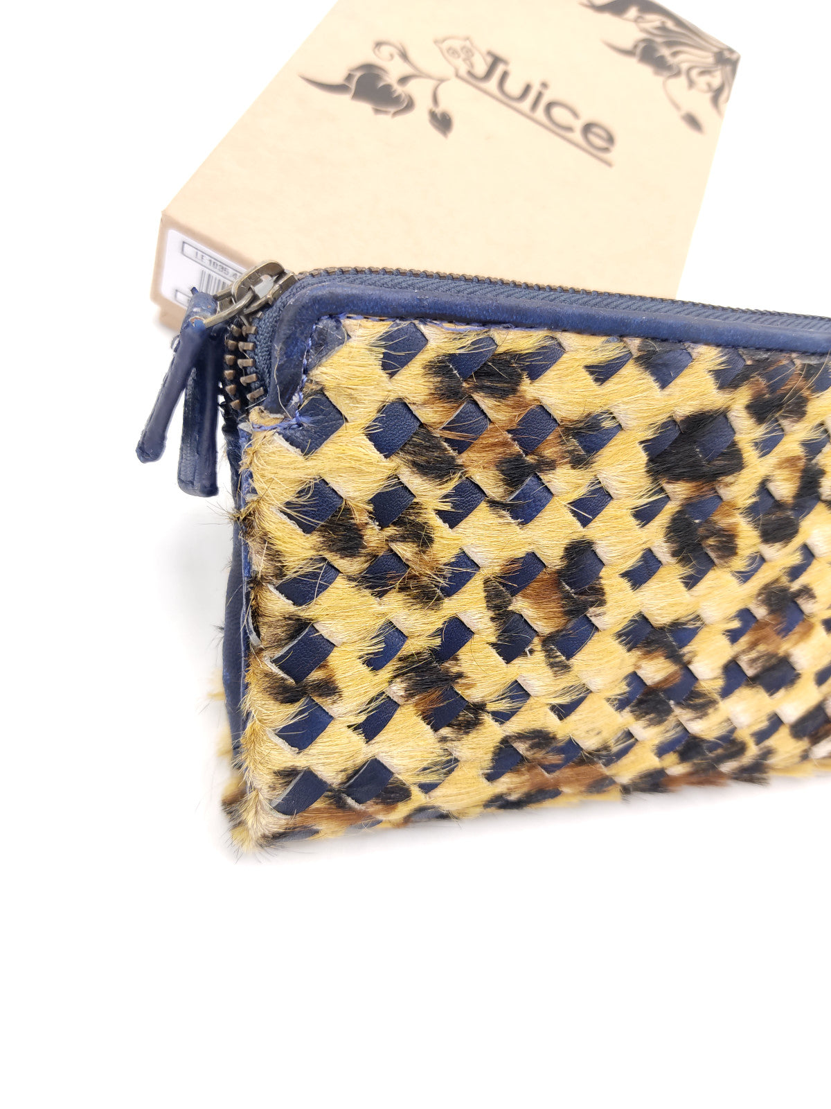 Washed leather and calf hair wallet art. LE1035.422