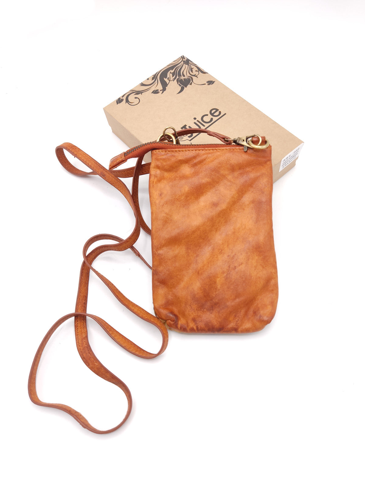 Washed leather and calf hair cellphone holder art. LE052.422